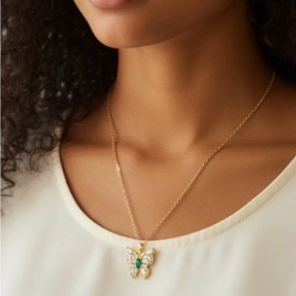 Elegant Gold Butterfly Pendant Necklace with green crystals NWT.